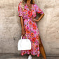 Elegante grote maat jurk met V-hals, bloemen patroon, hoge taille en split