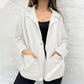 Dames cardigan met kraag voorzien van zakken